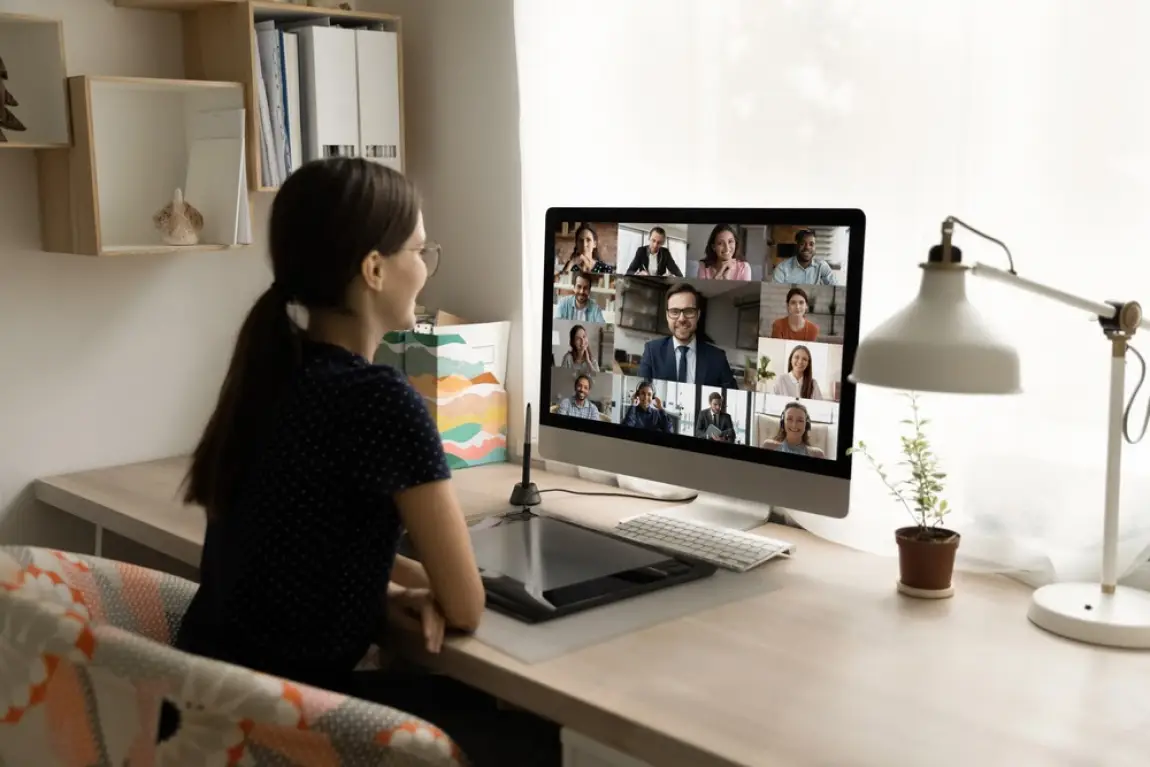 Woman attending zoom meeting