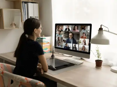 Woman attending zoom meeting